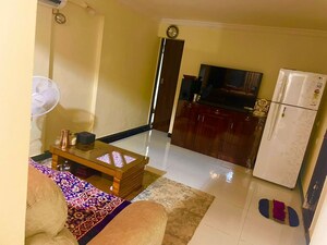 Living Room in 1 BHK Apartment at Royal Palms, Goregaon East – for Rent