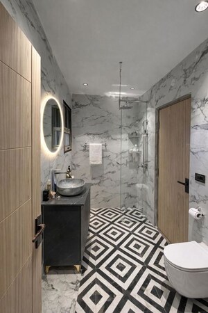 Bathroom in 4 BHK Builder Floor at Green Fields Colony – for Sale