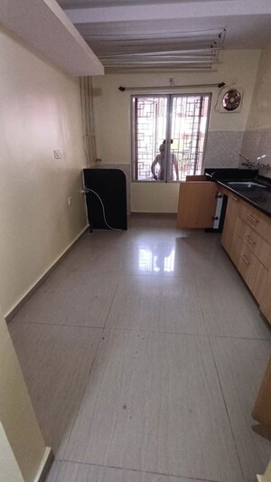 Kitchen in 2 BHK Apartment at Naiknavare Mystique Mood, Viman Nagar – for Rent