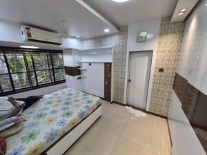 Bedroom in 2 BHK Apartment at Andheri Indira Nagar CHS, Andheri West – for Rent