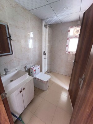 Bathroom in 3 BHK Apartment at Central Park Lake Front Towers, Sohna Sector 33 – for Rent