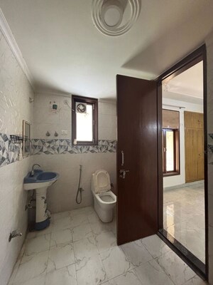 Bathroom in 2 BHK Apartment at Chattarpur – for Rent