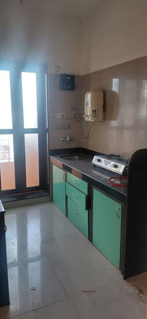 Kitchen in 1 BHK Apartment at Mira Nagar – for Rent