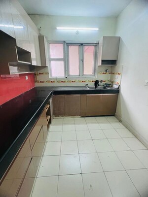 Kitchen in 3 BHK Apartment at UPAVP Brahmputra Enclave, Siddharth Vihar – for Rent