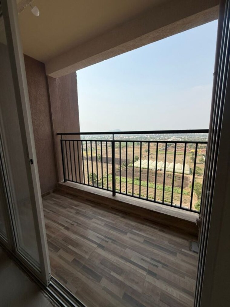 Balcony, kolte-patil-life-republic-16th-avenue-arezo 2 Bedroom 720 Sq.Ft. Apartment In Hinjewadi Pune 10316437