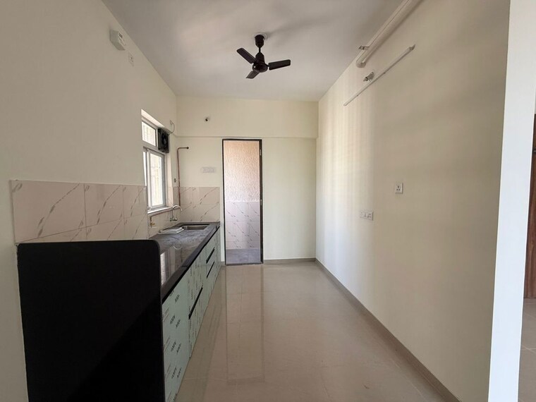 Kitchen, kolte-patil-life-republic-16th-avenue-arezo 2 Bedroom 720 Sq.Ft. Apartment In Hinjewadi Pune 10316437