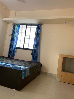 Bedroom in 2 BHK Apartment at Shantiban CHS, Kothrud – for Rent