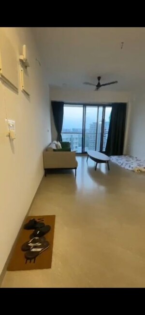 Living Room in 2 BHK Apartment at Naman Habitat, Andheri West – for Rent