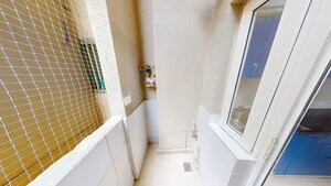 Bathroom in 2 BHK Apartment at Bhartiya City Nikoo Homes II, Thanisandra Main Road – for Sale