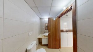 Bathroom in 2 BHK Apartment at Bhartiya City Nikoo Homes II, Thanisandra Main Road – for Sale