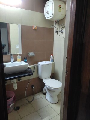 Bathroom in 3 BHK Apartment at Mahagun Mywoods II, Sector 16c Greater Noida – for Sale