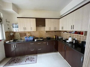 Kitchen in 4 BHK Apartment at Mahagun My Woods, Sector 16c Greater Noida – for Rent