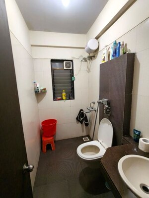 Bathroom in 2 BHK Apartment at Naupada – for Rent