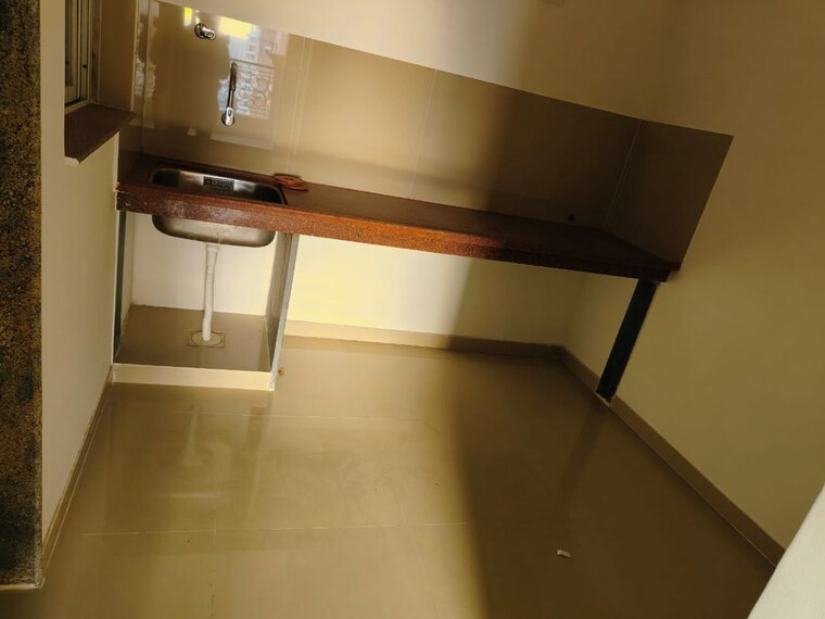 Kitchen, the-pearl 2 Bedroom 1000 Sq.Ft. Apartment In Balewadi Pune 10316874
