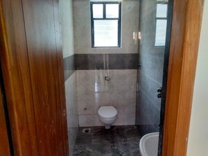Bathroom in 2 BHK Apartment at Swaraaj Heights, Punawale – for Rent