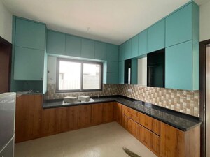 Kitchen in 4 BHK Villa at Adarsh Palm Acres, Huttanahalli – for Rent