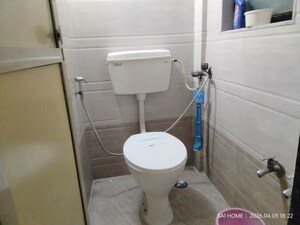 Bathroom in 2 BHK Apartment at Radha Nagar, Kalyan West – for Rent