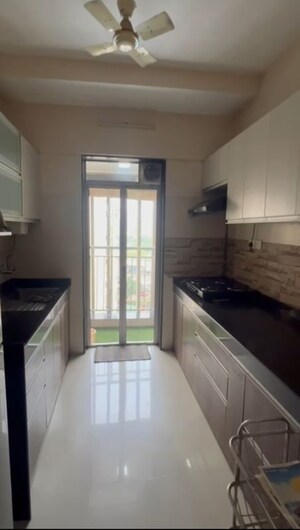 Kitchen in 1.5 BHK Apartment at Akruti Hubtown, Mira Road – for Rent