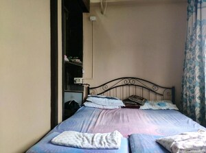 Bedroom in 2 BHK Apartment at Walkeshwar – for Sale