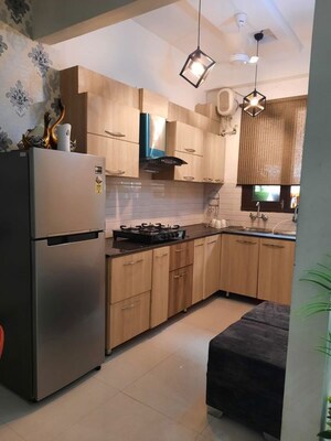Kitchen in 2 BHK Apartment at Jaipuria Sunrise Green, Lohgarh – for Rent