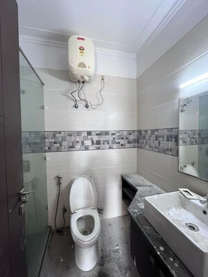 Bathroom in 3 BHK Builder Floor at Sushant Vyapaar Kendra, Dlf Phase iv – for Rent