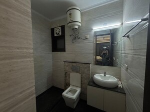 Bathroom in 3 BHK Builder Floor at Ansal Sushant Lok I, Sector 43 – for Rent