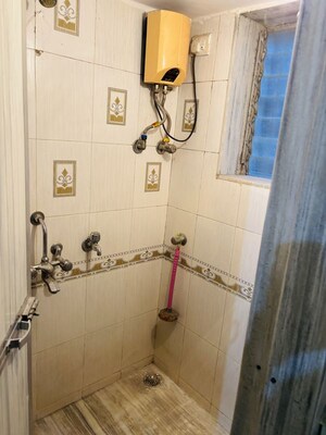 Bathroom in 1 BHK Apartment at Mulund West – for Rent