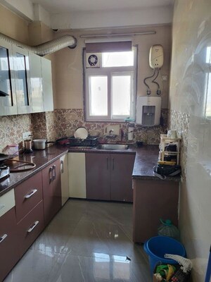 Kitchen in 3 BHK Apartment at Golf Course Road – for Rent