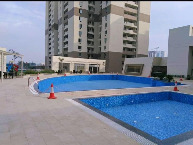 Swimming Pool, vatika-gurgaon-21 3 Bedroom 1733 Sq.Ft. Apartment In Sector 83 Gurgaon 10194157