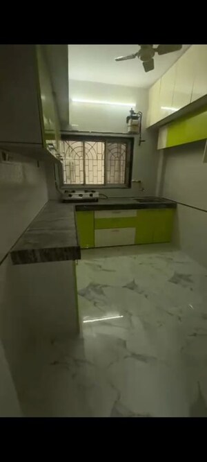 Kitchen in 3 BHK Apartment at Amarjyothi Chs, Vashi Sector 14 – for Rent