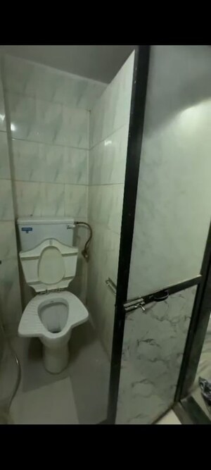 Bathroom in 3 BHK Apartment at Amarjyothi Chs, Vashi Sector 14 – for Rent