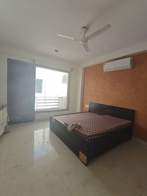 Bedroom in 3 BHK Builder Floor at Ansal Sushant Lok I, Sector 43 – for Rent