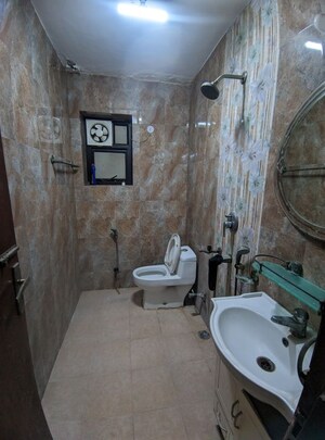 Bathroom in 2 BHK Apartment at Eros Southend Apartments, Charmwood Village – for Rent