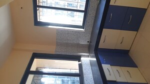 Kitchen in 2 BHK Apartment at Shankheshwar Arcade, Naupada – for Sale