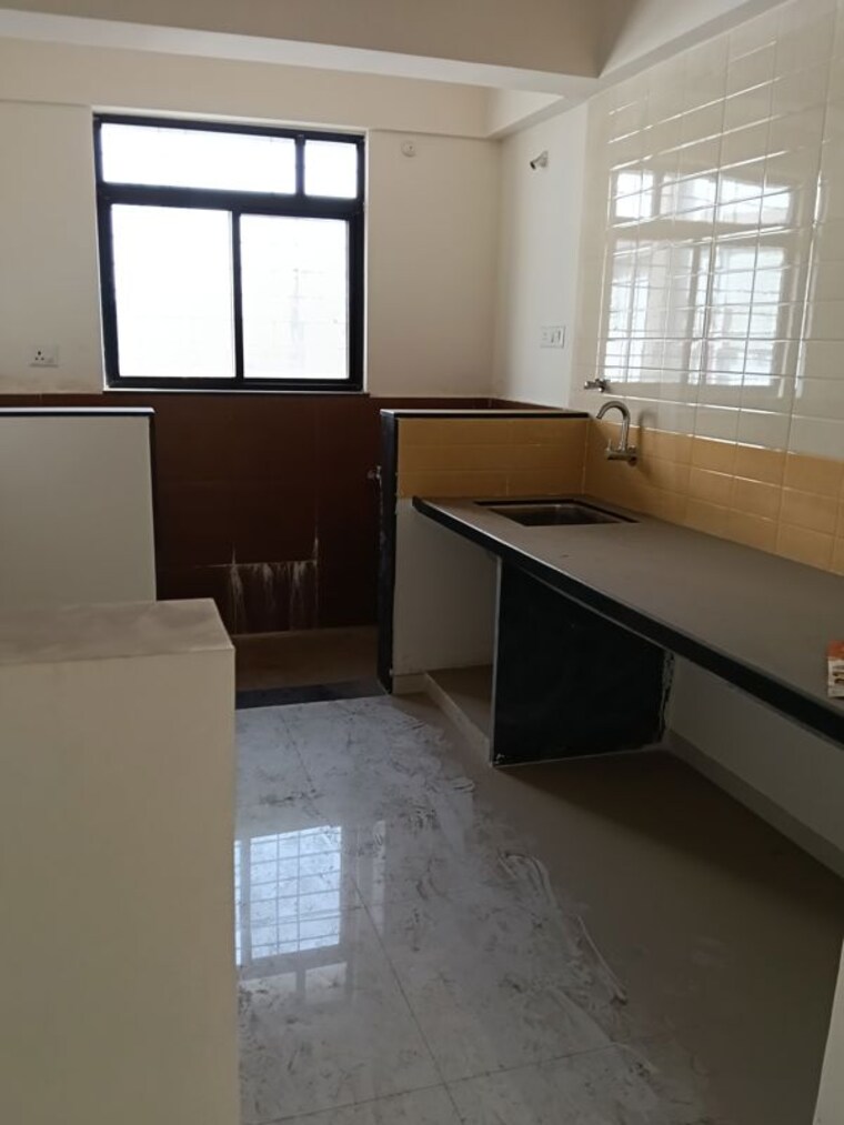 Kitchen, pristine-prolife-1 2 Bedroom 750 Sq.Ft. Apartment In Wakad Pune 10317322