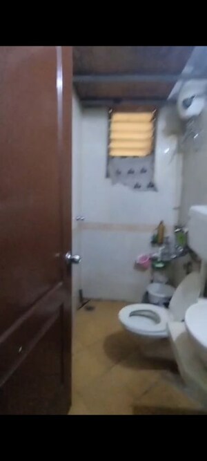 Bathroom in 2 BHK Apartment at Shiv Triveni Galleria CHS, Sanpada – for Rent