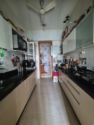Kitchen in 2.5 BHK Apartment at The Wadhwa Palm Beach Residency, Nerul Sector 4 – for Sale