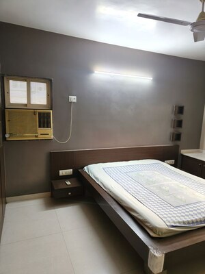 Bedroom in 2 BHK Apartment at NRI Complex Phase 2, Seawoods – for Rent