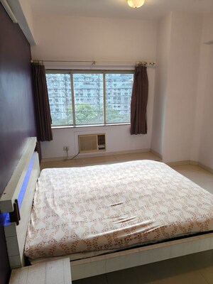 Bedroom in 2 BHK Apartment at NRI Complex Phase 2, Seawoods – for Rent