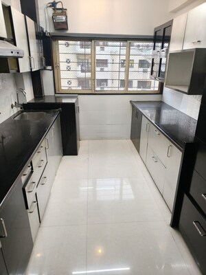 Kitchen in 2 BHK Apartment at NRI Complex Phase 2, Seawoods – for Rent