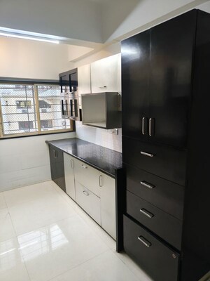 Kitchen in 2 BHK Apartment at NRI Complex Phase 2, Seawoods – for Rent