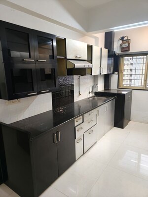 Kitchen in 2 BHK Apartment at NRI Complex Phase 2, Seawoods – for Rent