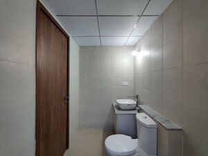 Bathroom in  Apartment at Bhartiya City Nikoo Homes 4, Thanisandra Main Road – for Sale