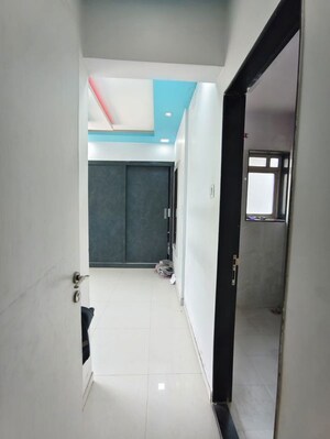 Building Lobby in 1 BHK Apartment at Puranik City, Kasarvadavali – for Rent