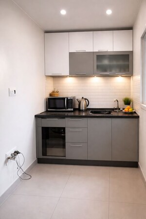 Kitchen in 1 BHK Apartment at Yamuna Apartments Bibwewadi, Bibwewadi – for Sale