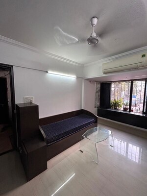 Living Room in 1.5 BHK Apartment at Mangal Orchid Chs, Andheri West – for Rent
