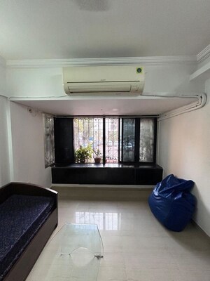 Living Room in 1.5 BHK Apartment at Mangal Orchid Chs, Andheri West – for Rent