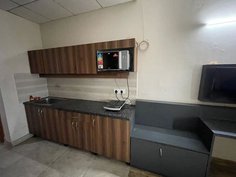 Kitchen, paramount-golf-forest-studio-apartments-oak-tower 1 RK 435 Sq.Ft. Apartment In Zeta I Greater Noida Greater Noida 10317602