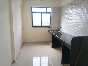 Kitchen in 1 BHK Apartment at Moze Unique Residency, Wagholi – for Rent