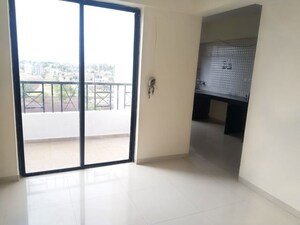 Living Room in 1 BHK Apartment at Moze Unique Residency, Wagholi – for Rent
